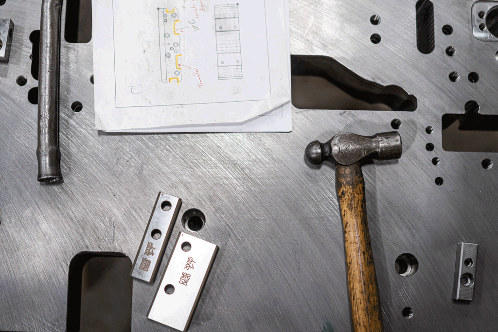 Tools on table being used for die making.
