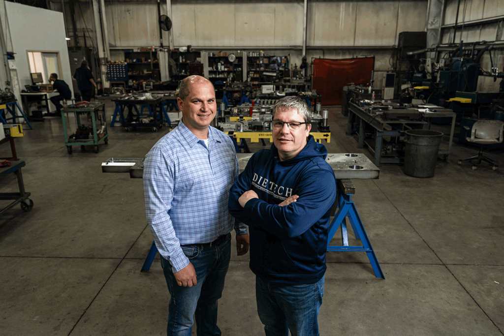 Owner Bob Tilden standing alongside his manager.